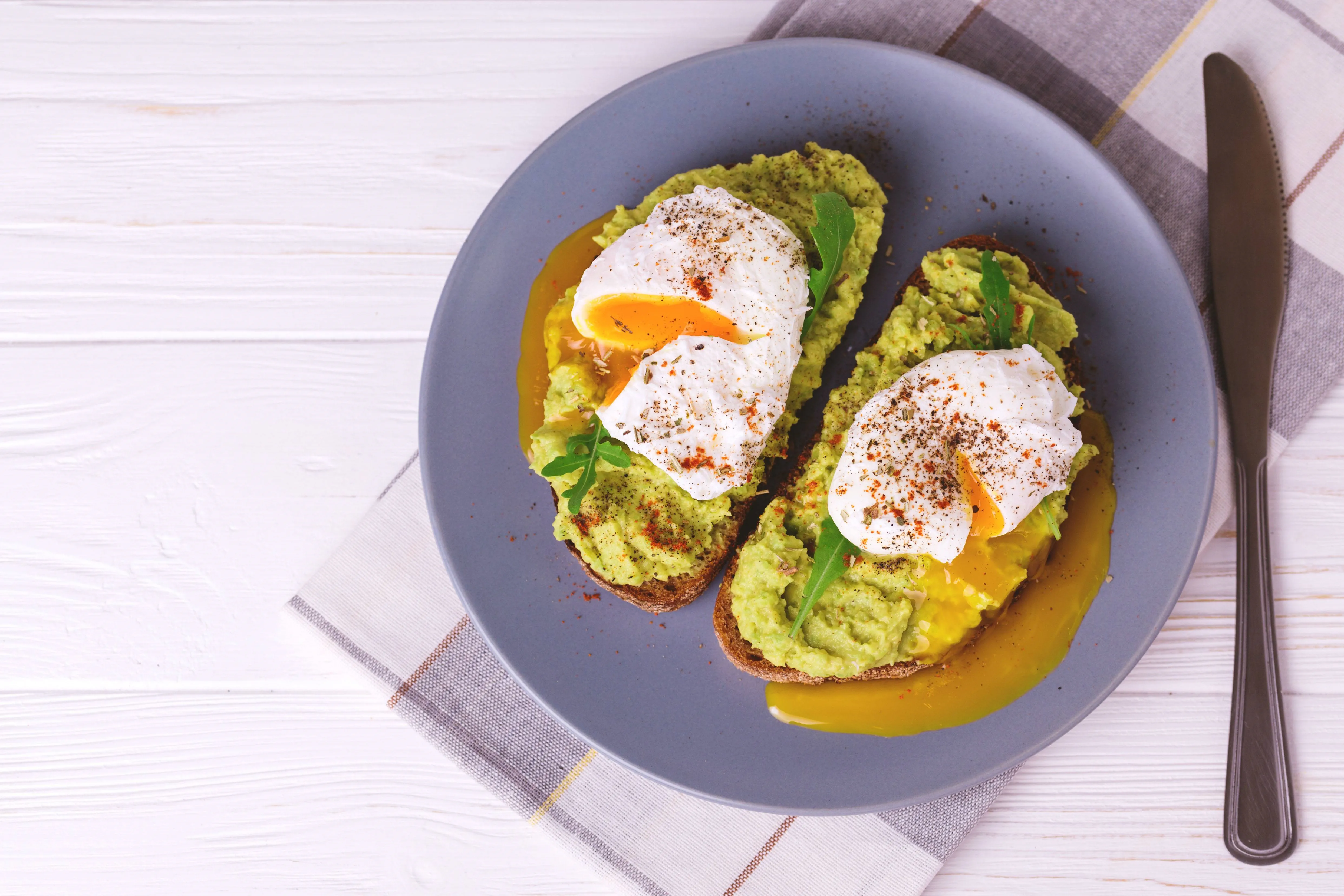recipe image Smashed avocado and poached eggs on toast